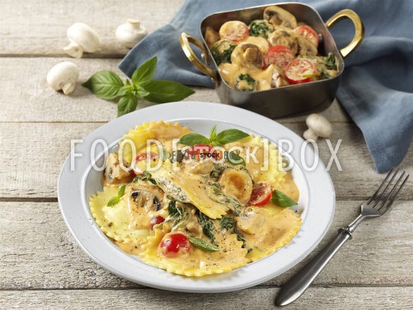 Champignon-Tomatenragout mit Frischkäse-Ravioli