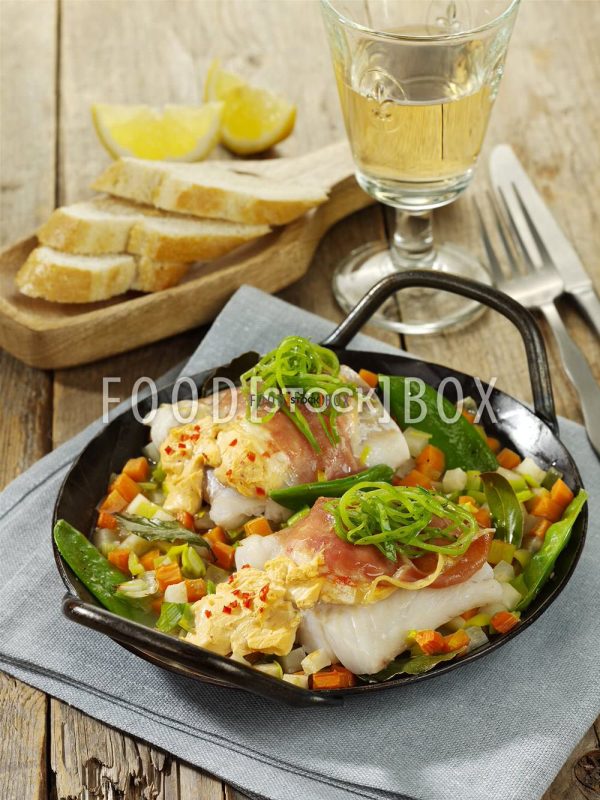 Fischpäckchen auf Gemüse