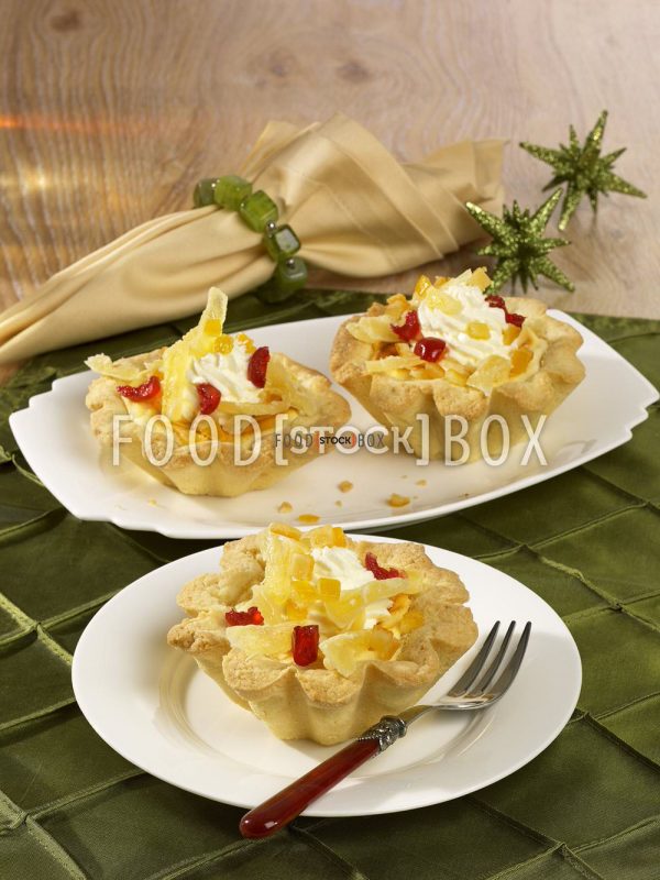 Käsekuchen-Törtchen mit kandierten Früchten